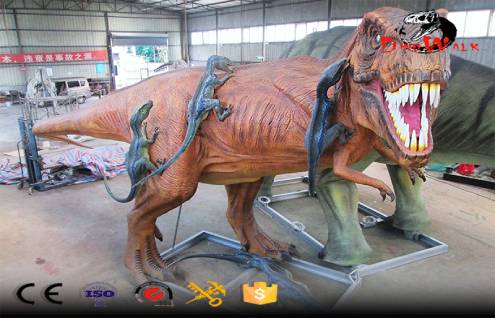 huge animatronic T-rex fighting velociraptor for dinosaur park