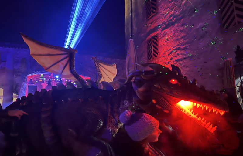 Realistic animatronic walking dragon costume shown in Germany