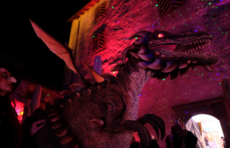 Realistic animatronic walking dragon costume shown in Germany