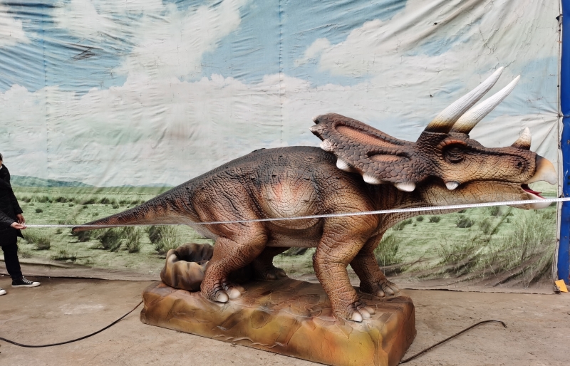 Entertainment interactive coin operation animatronic laying egg dinosaur