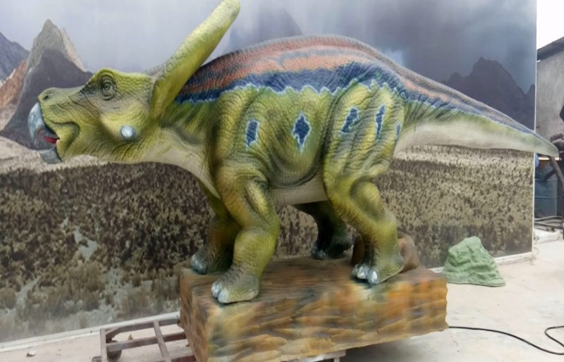 Entertainment interactive coin operation animatronic laying egg dinosaur