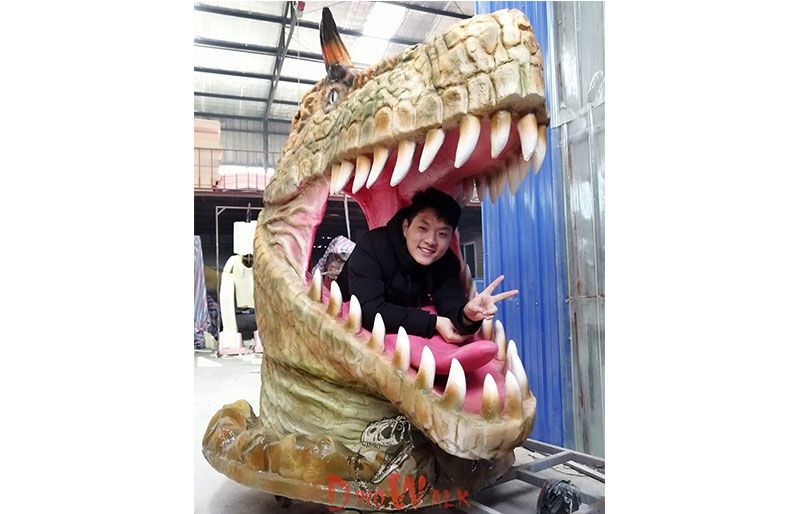 Gigantic fiberglass dinosaur's head for photo shooting